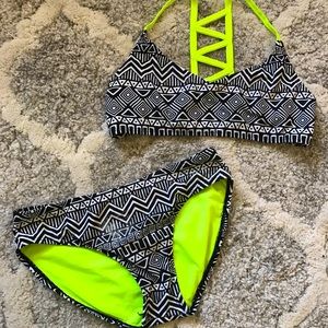 Black, White, and neon green girls swimsuit